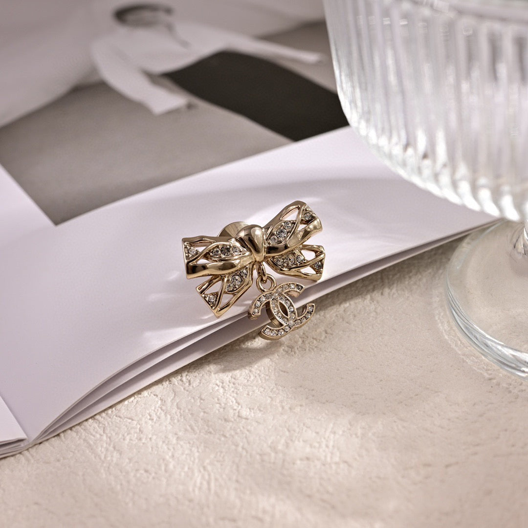 Signature Emblem Brooch in Polished Metal-Tone – Design 049 front product view
