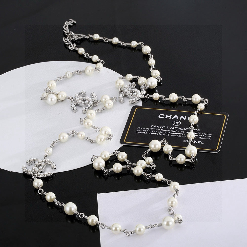 Double-C Emblem Pearl-Detail Pendant Necklace – Pearl Detail – Design 096 detail view