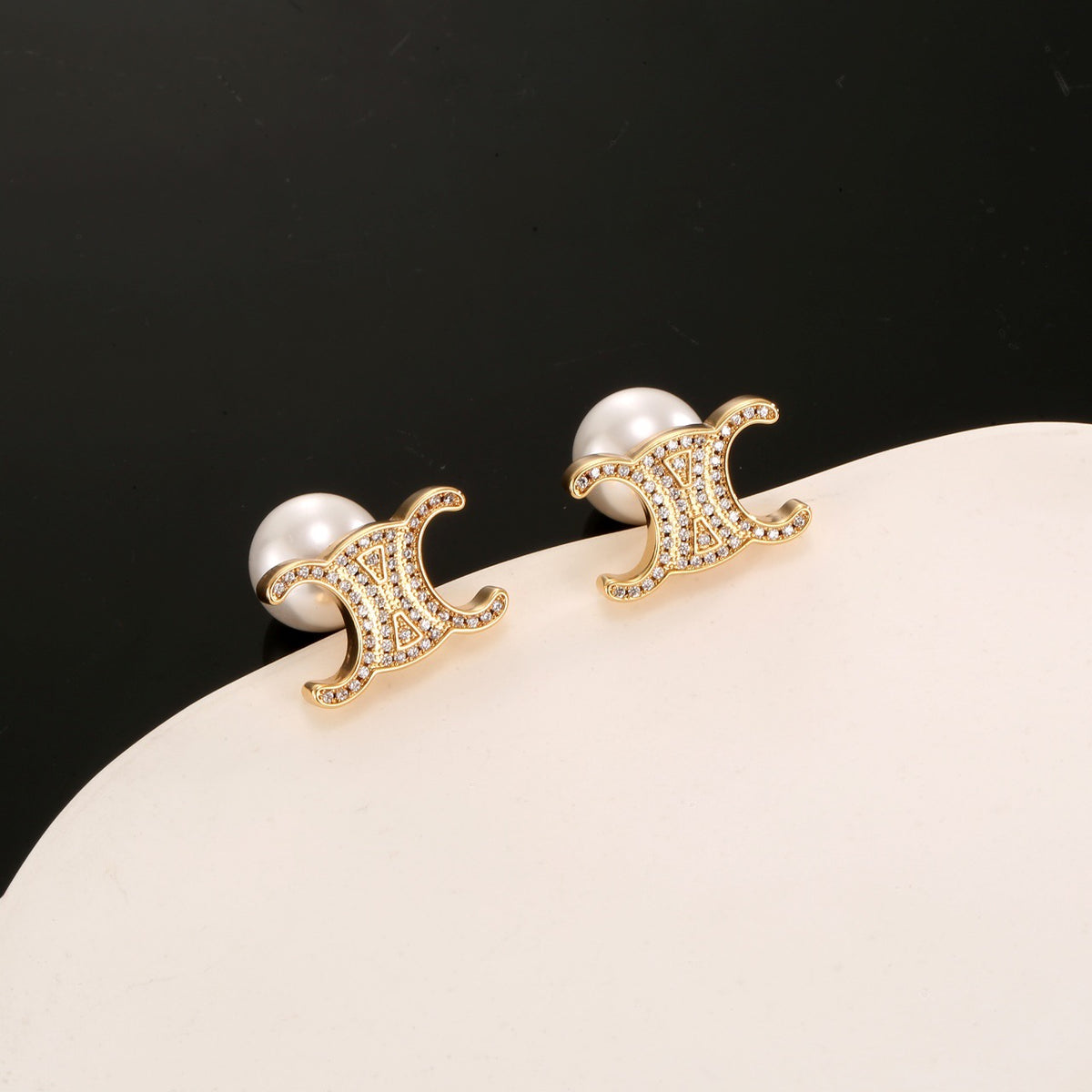 Signature Emblem Stud Earrings in Gold-Tone – Design 09 close-up view