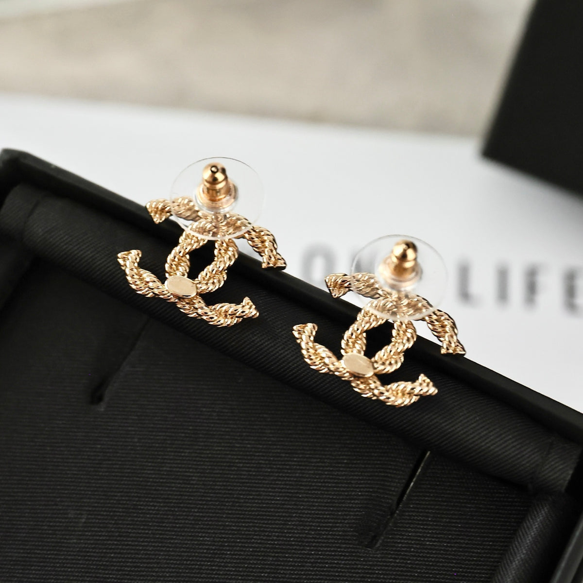 Double-C Emblem Stud Earrings in Polished Metal-Tone – Design 325 side detail