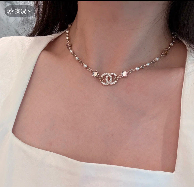 Double-C Emblem Pearl-Detail Pendant Necklace – Pearl Detail – Design 103 close-up detail