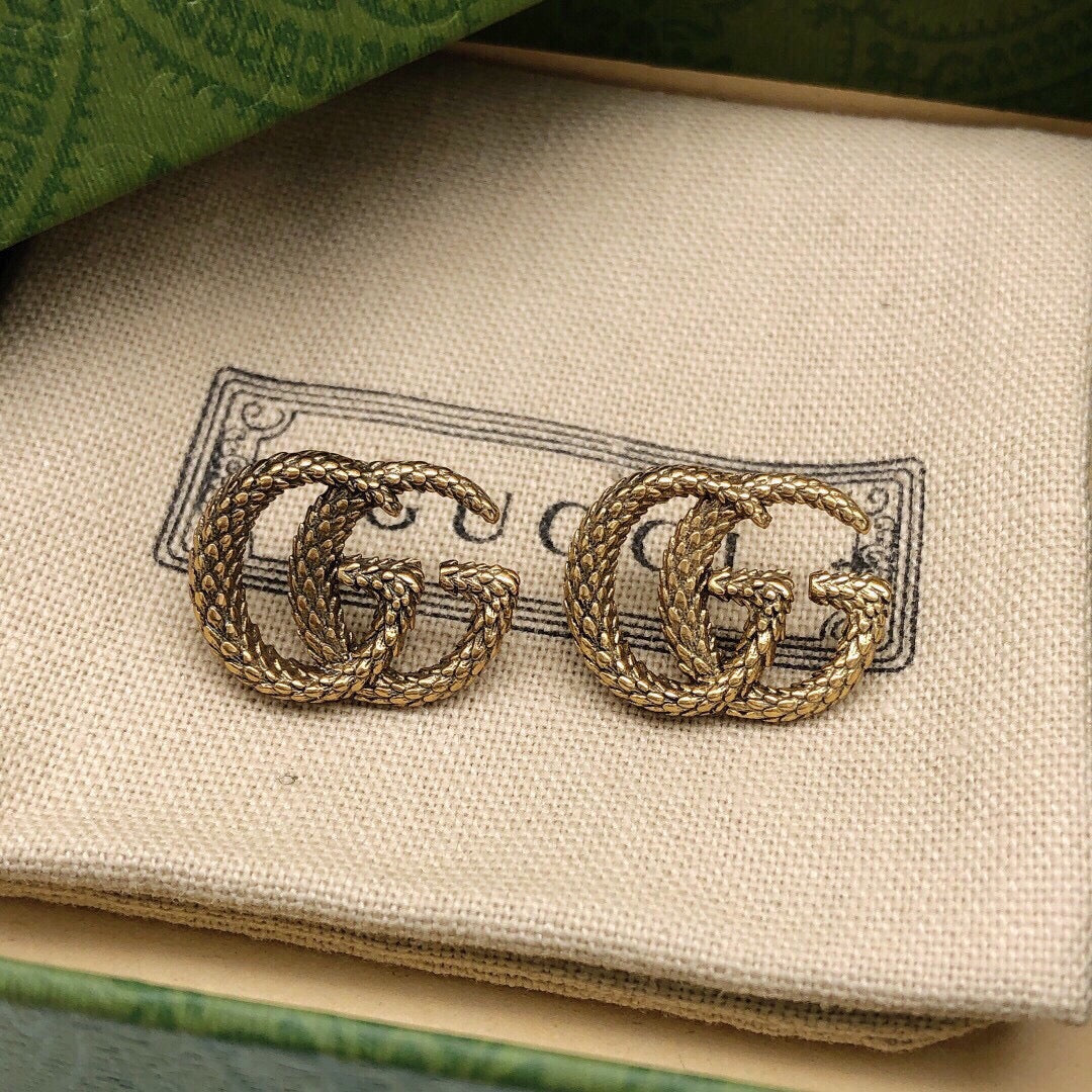 Serpentine Stud Earrings in Silver-Tone styled product view