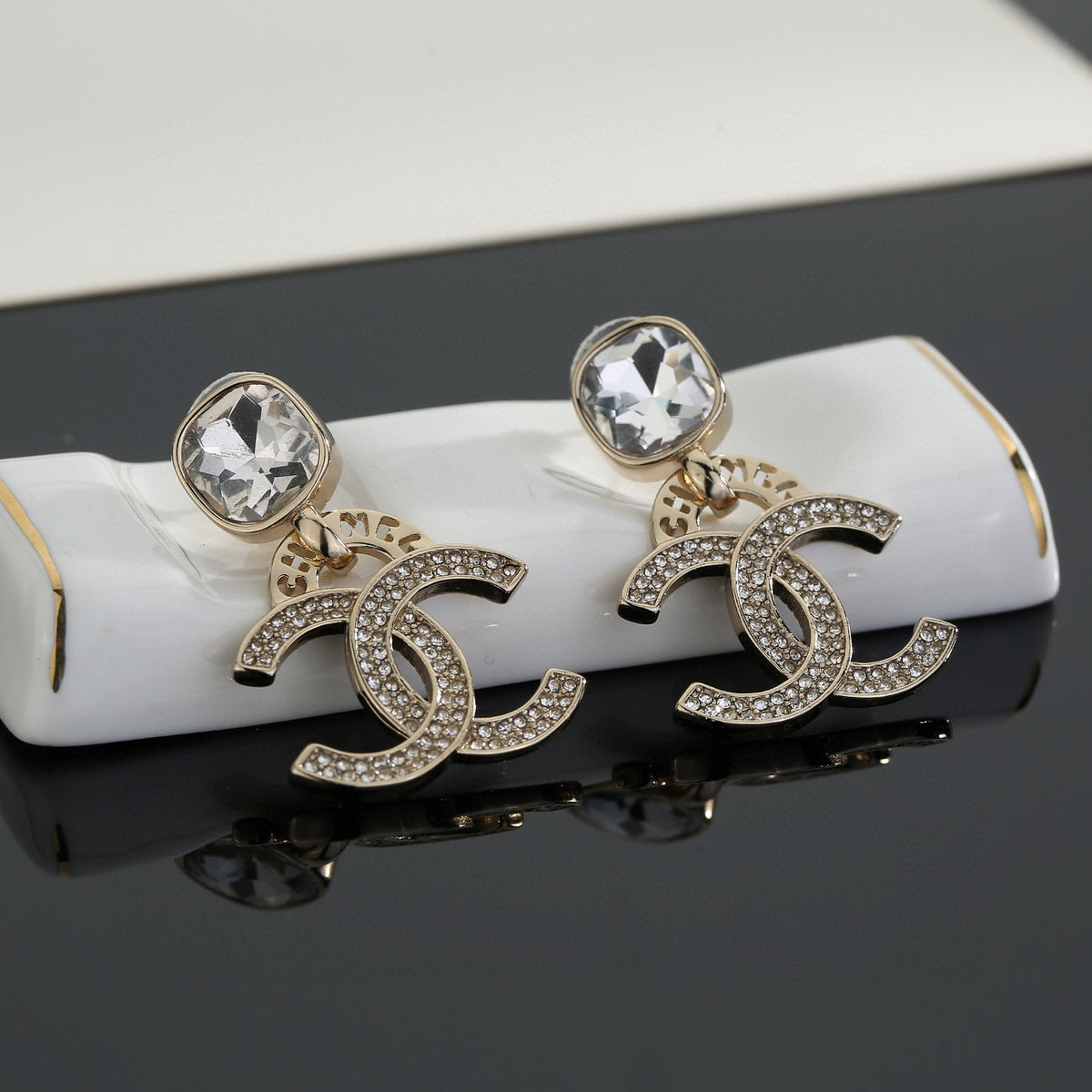 Double-C Emblem Stud Earrings in Gold-Tone – Design 012 side detail