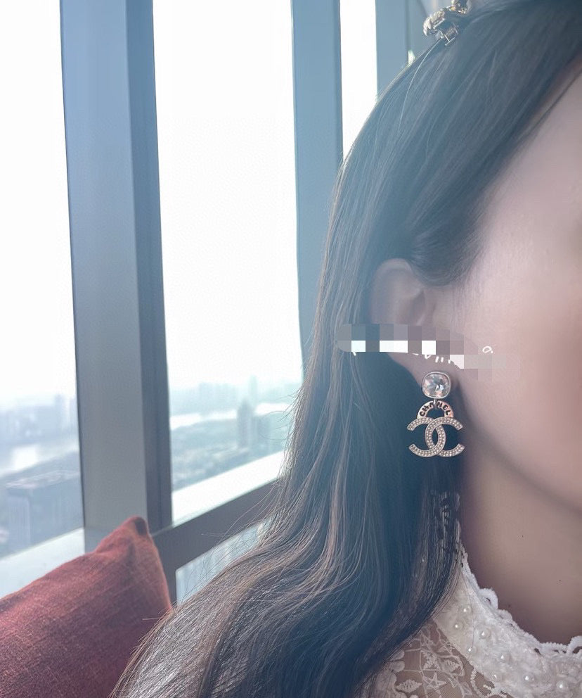Double-C Emblem Stud Earrings in Gold-Tone – Design 012 close-up detail
