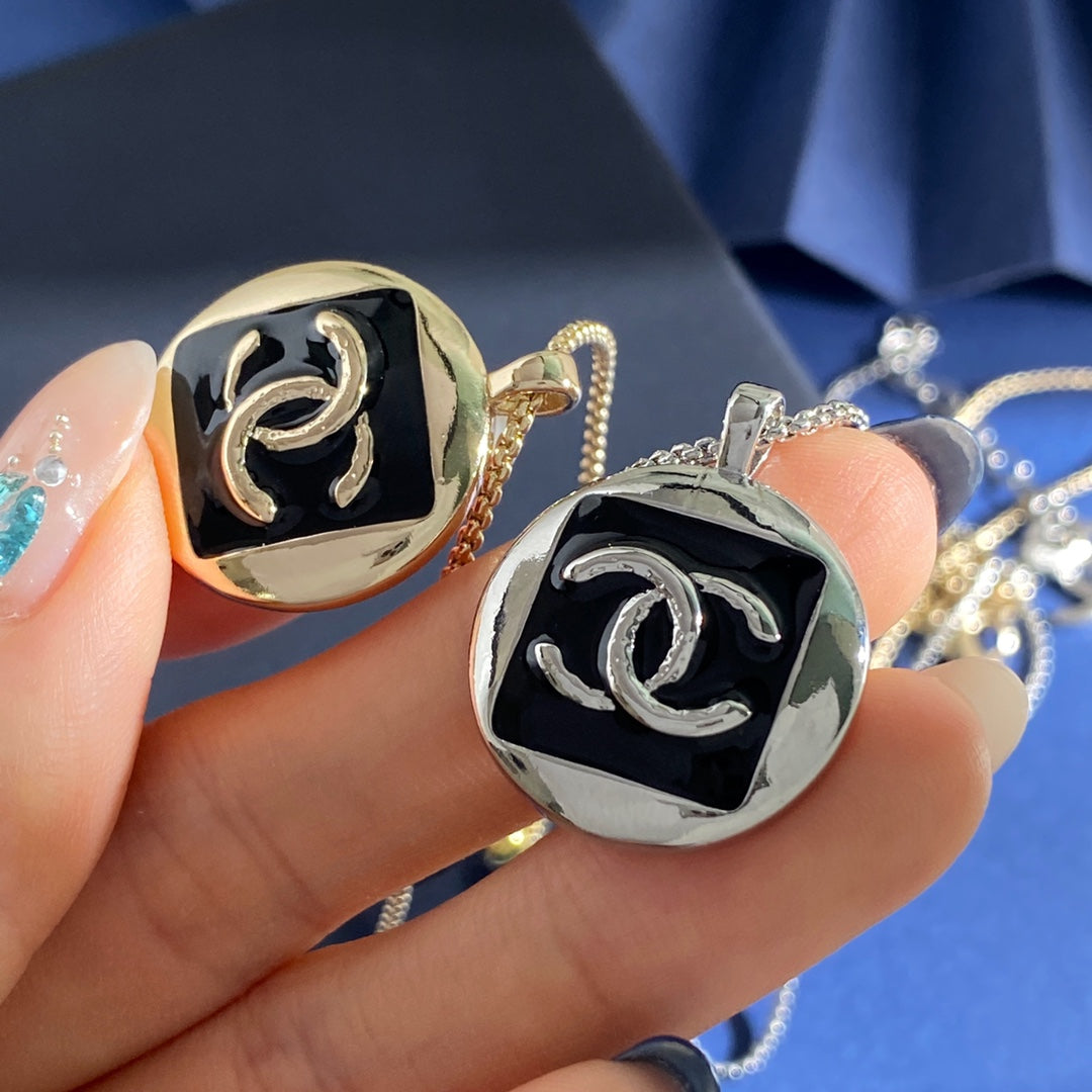 Double-C Emblem Pendant Necklace in Gold-Tone – Black Detail – Design 002 styled product view