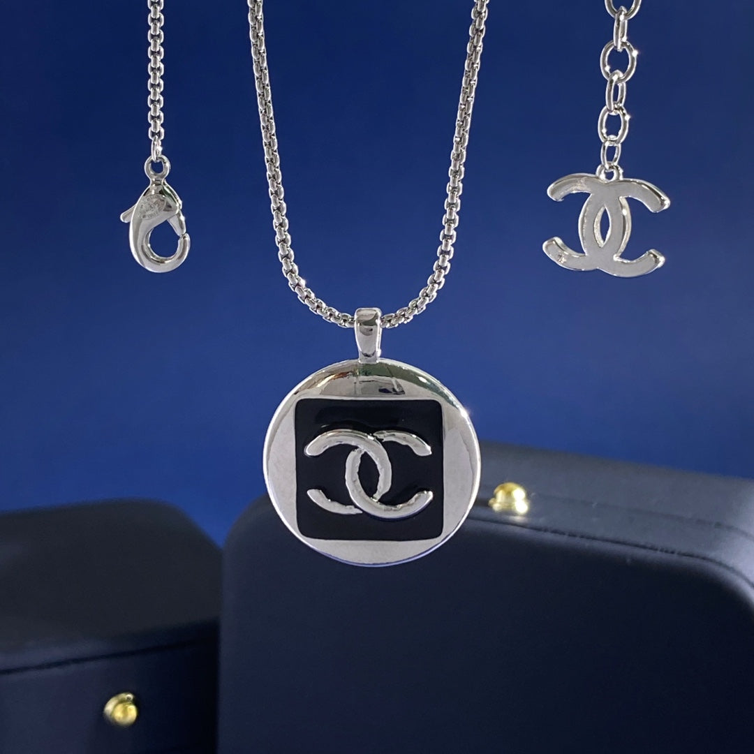 Double-C Emblem Pendant Necklace in Gold-Tone – Black Detail – Design 002 detail view