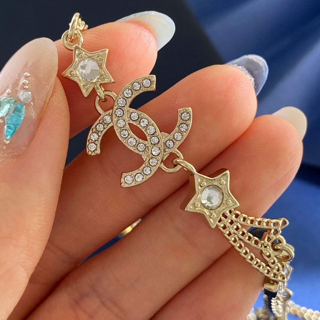 Letter Crystal-Accent Pendant Necklace – Star Detail front product view
