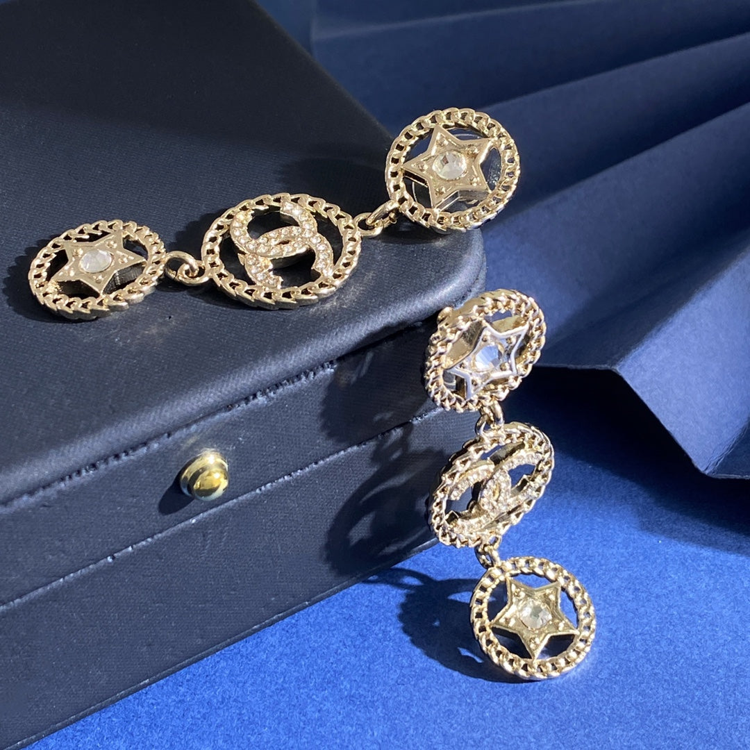 Double-C Emblem Stud Earrings in Gold-Tone – Star Detail – Design 009 detail view