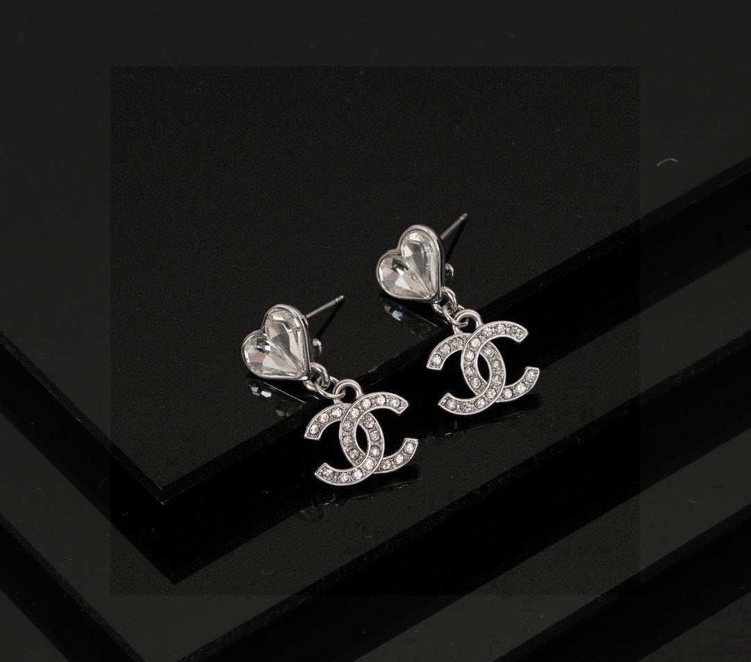 Double-C Emblem Stud Earrings in Polished Metal-Tone – Design 350 close-up detail