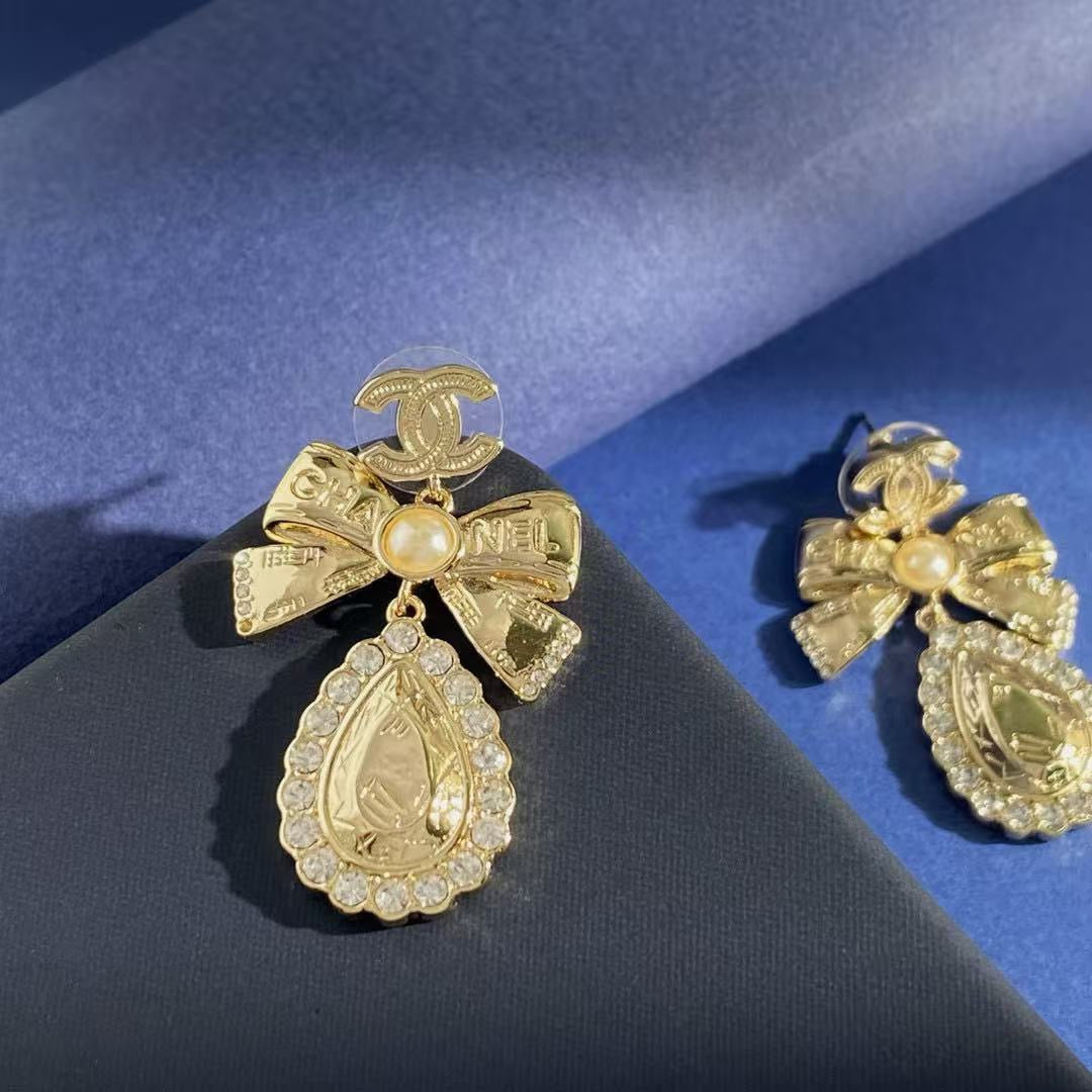 Double-C Emblem Stud Earrings in Gold-Tone – Design 014 close-up detail
