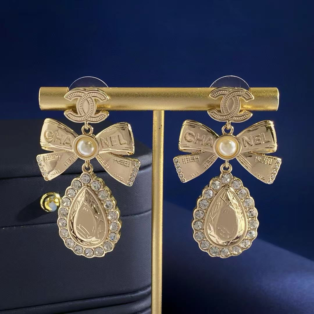 Double-C Emblem Stud Earrings in Gold-Tone – Design 014 detail view