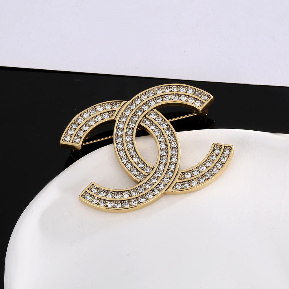Double-C Emblem Brooch in Gold-Tone – Design 015 styled product view