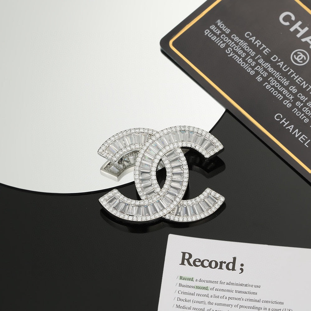 Signature Emblem Brooch in Polished Metal-Tone – Design 040 close-up detail