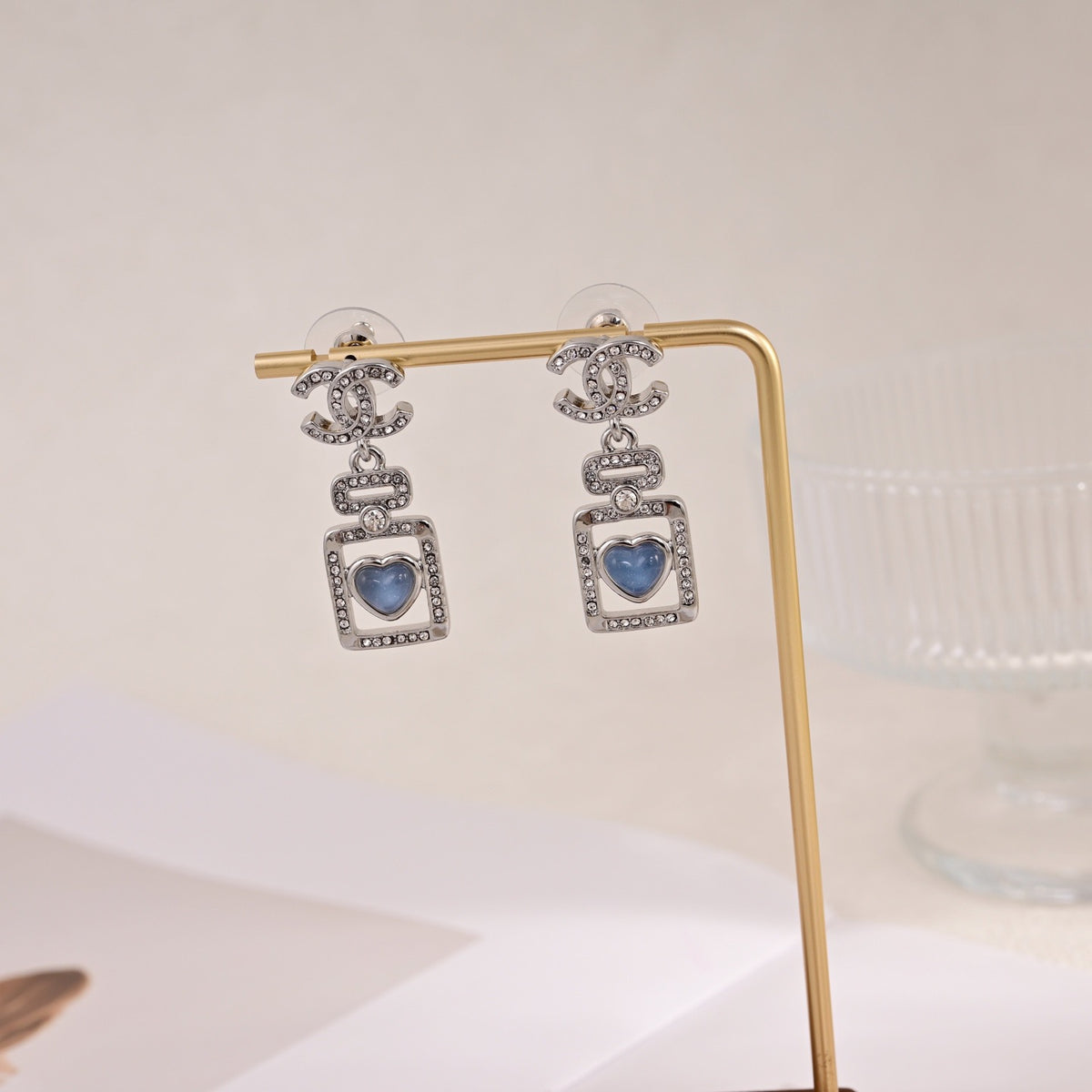 Signature Emblem Stud Earrings in Polished Metal-Tone – Design 112 detail view
