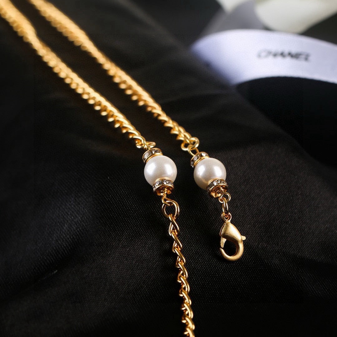 Double-C Emblem Pearl-Detail Pendant Necklace – Pearl Detail – Design 135 side detail