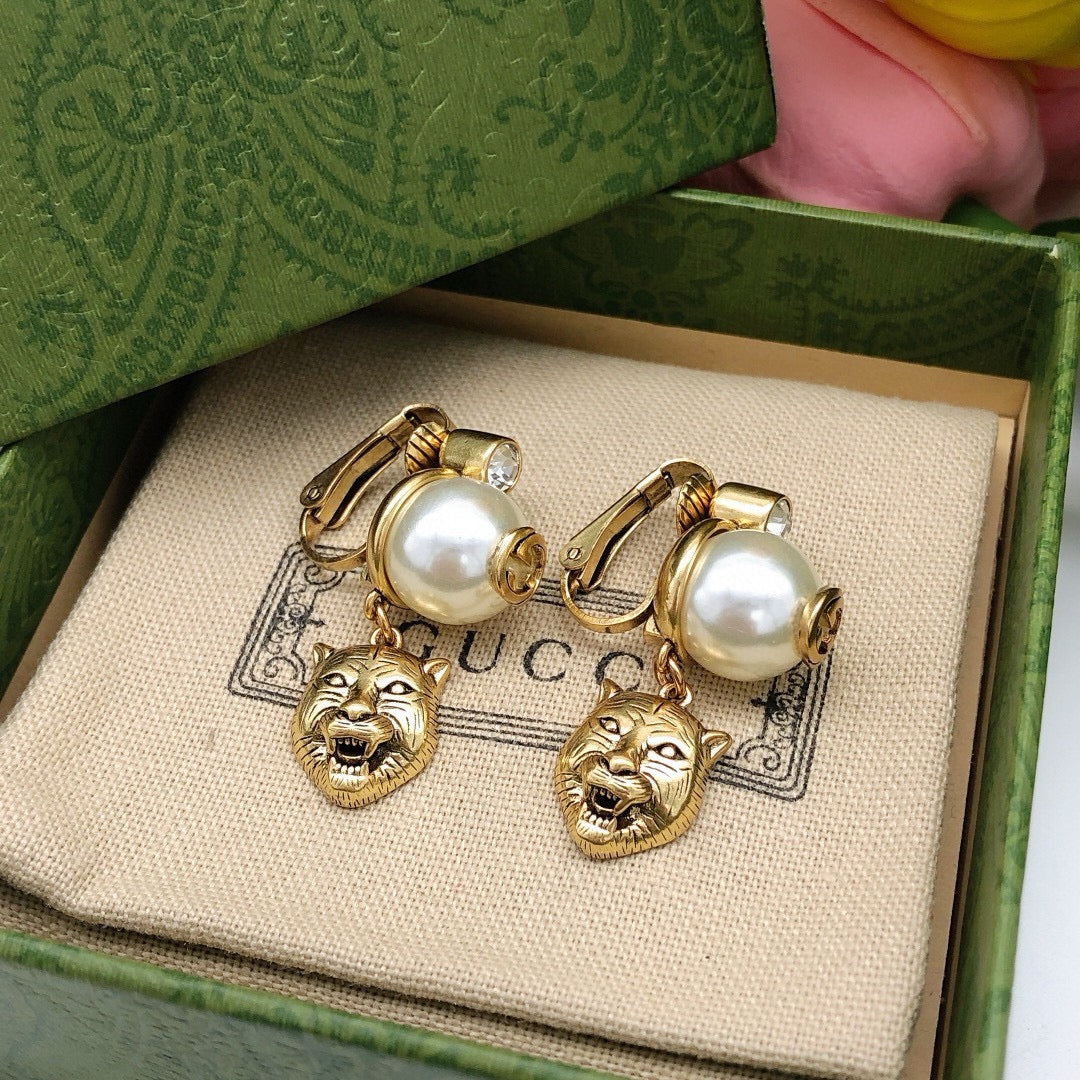 Tiger Head Statement Earrings in Polished Metal-Tone close-up detail