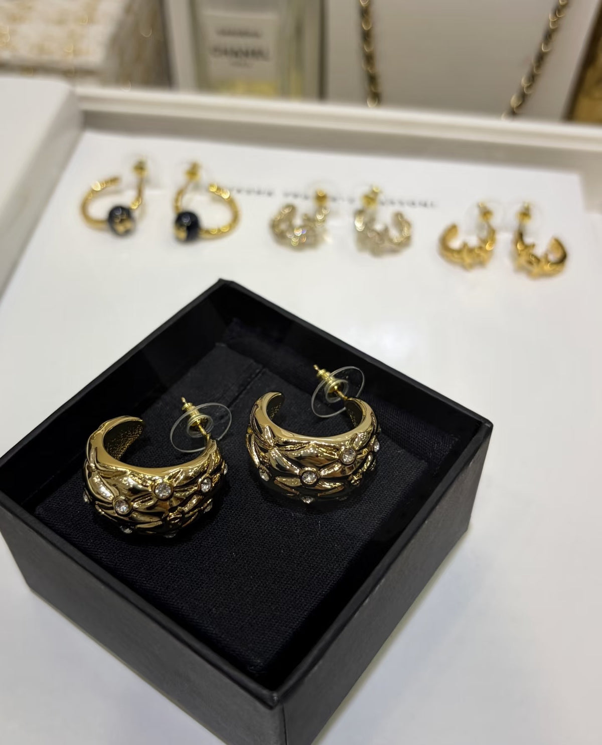 Signature Emblem Stud Earrings in Gold-Tone – Design 072 close-up detail