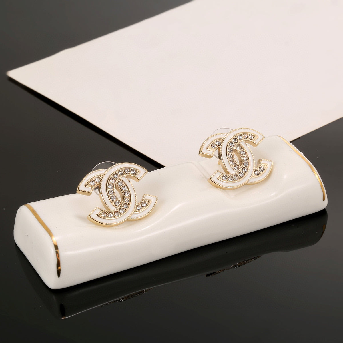 Double-C Emblem Stud Earrings in Polished Metal-Tone – Design 438 front product view