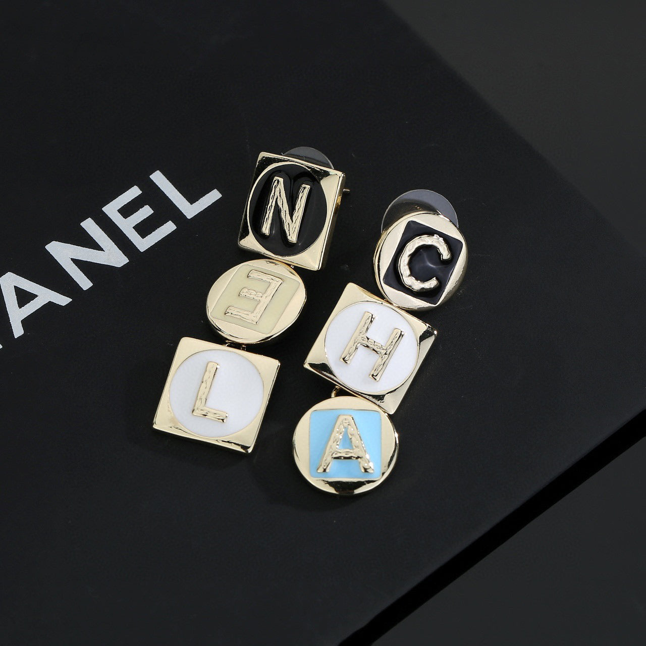 Letter Stud Earrings in Polished Metal-Tone – Design 006 styled product view