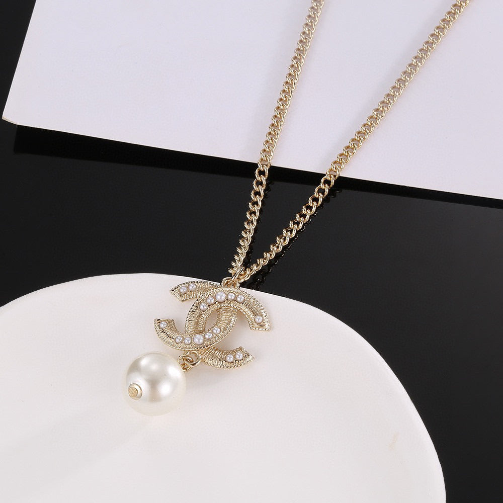 Double-C Emblem Pearl-Detail Pendant Necklace – Pearl Detail – Design 027 front product view