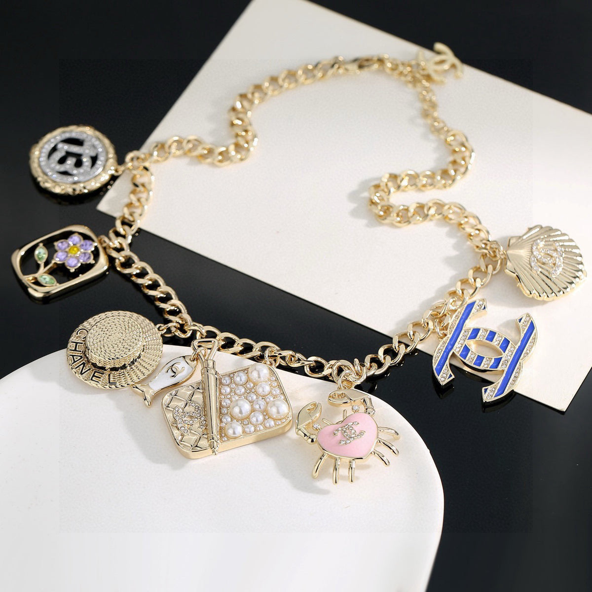 Double-C Emblem Pendant Necklace in Gold-Tone – Shell Detail main product view