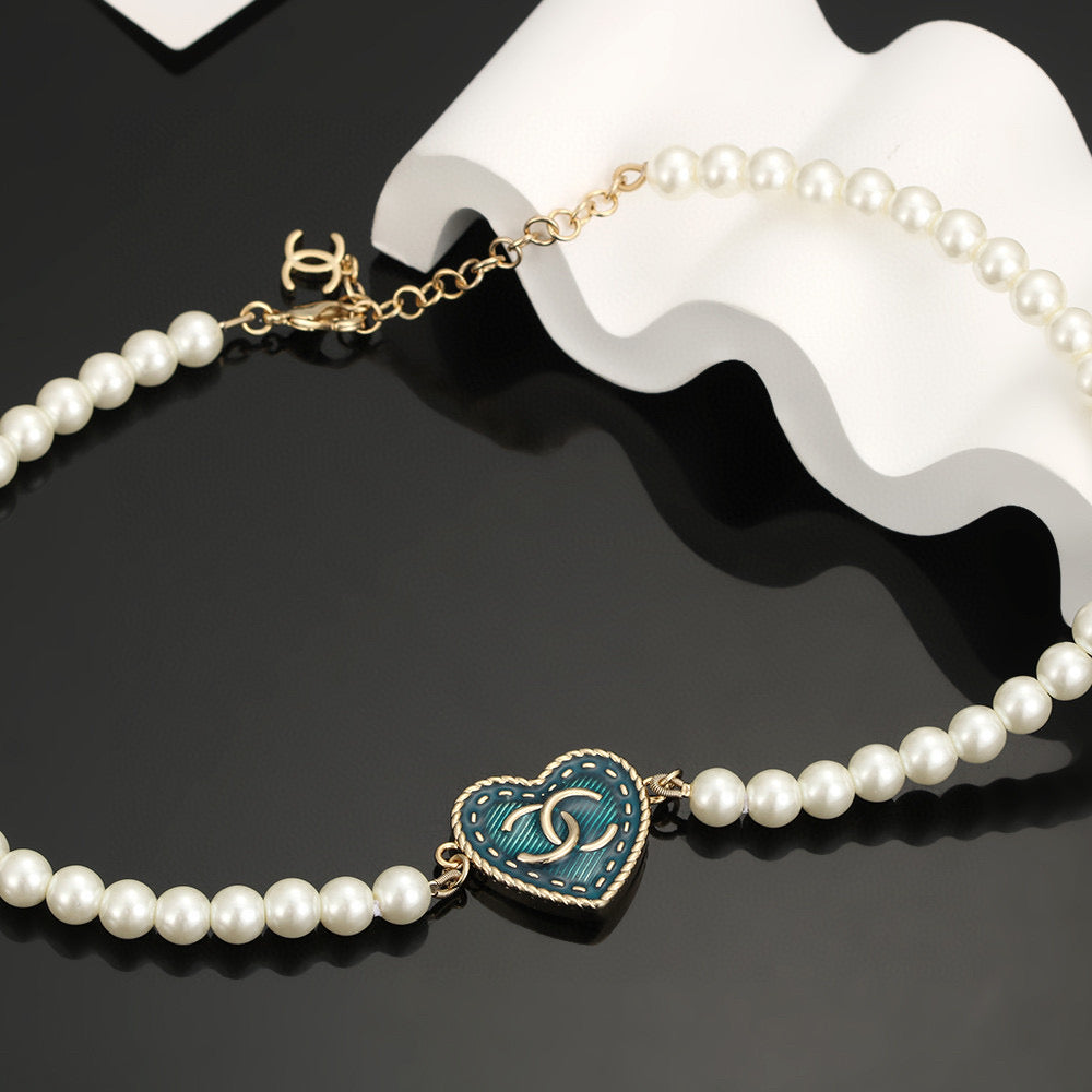 Double-C Emblem Bracelet in Polished Metal-Tone – Pearl Detail – Design 004 detail view