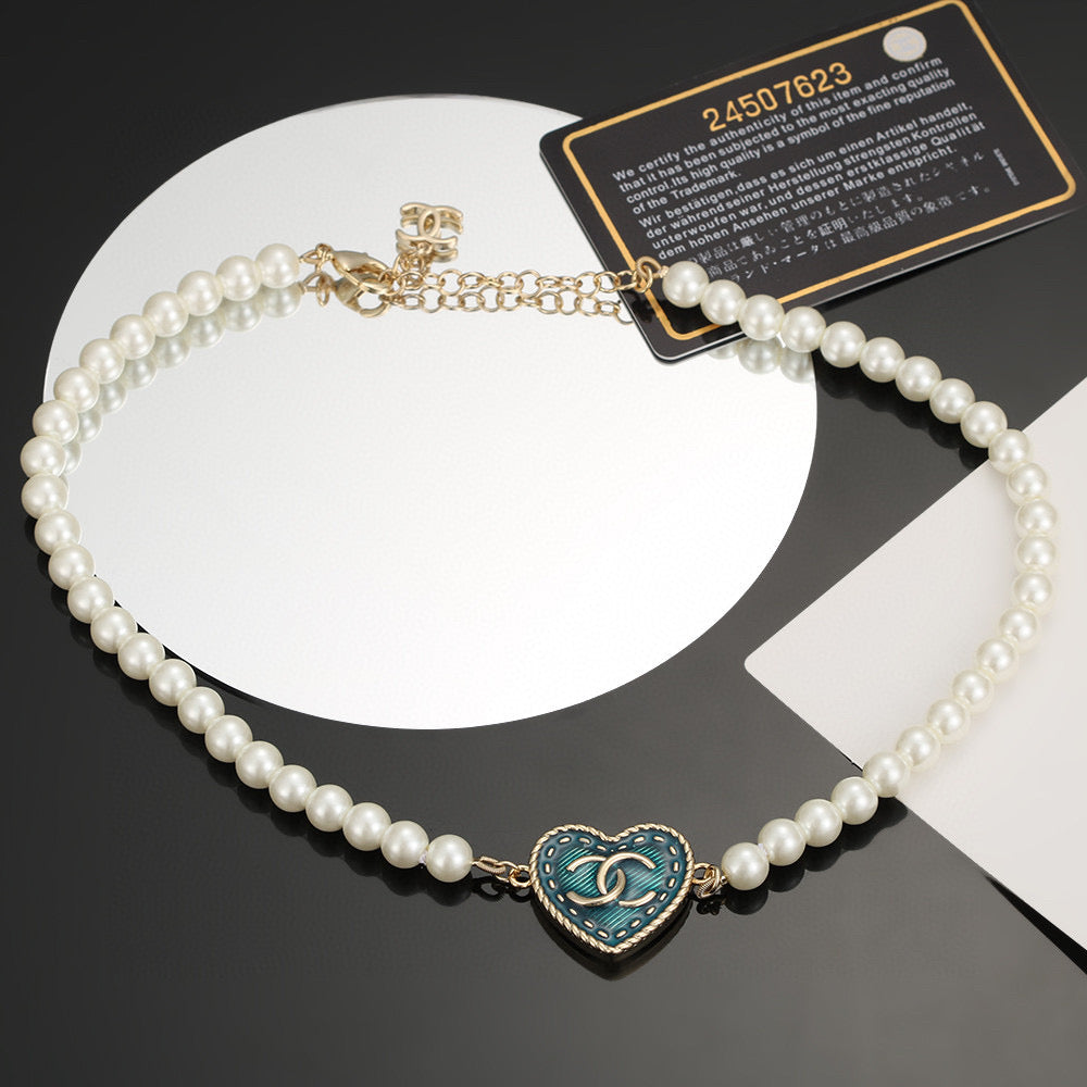 Double-C Emblem Bracelet in Polished Metal-Tone – Pearl Detail – Design 004 front product view