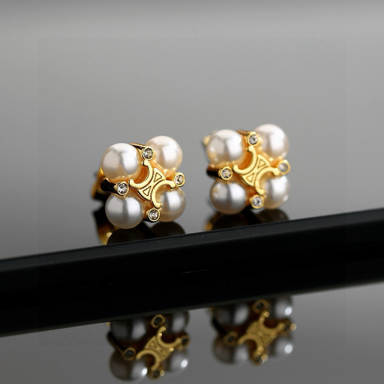 Signature Emblem Stud Earrings in Gold-Tone – Design 10 front view