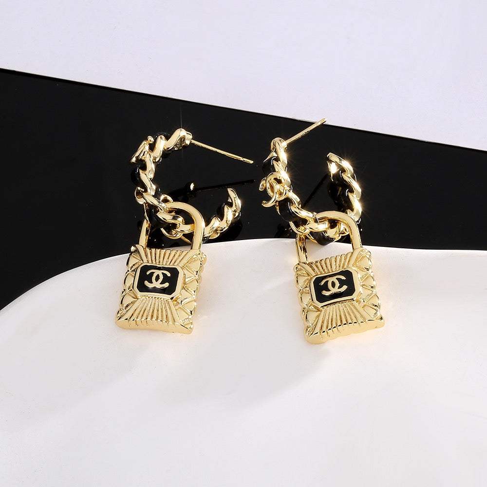 Double-C Emblem Stud Earrings in Gold-Tone – Design 050 detail view
