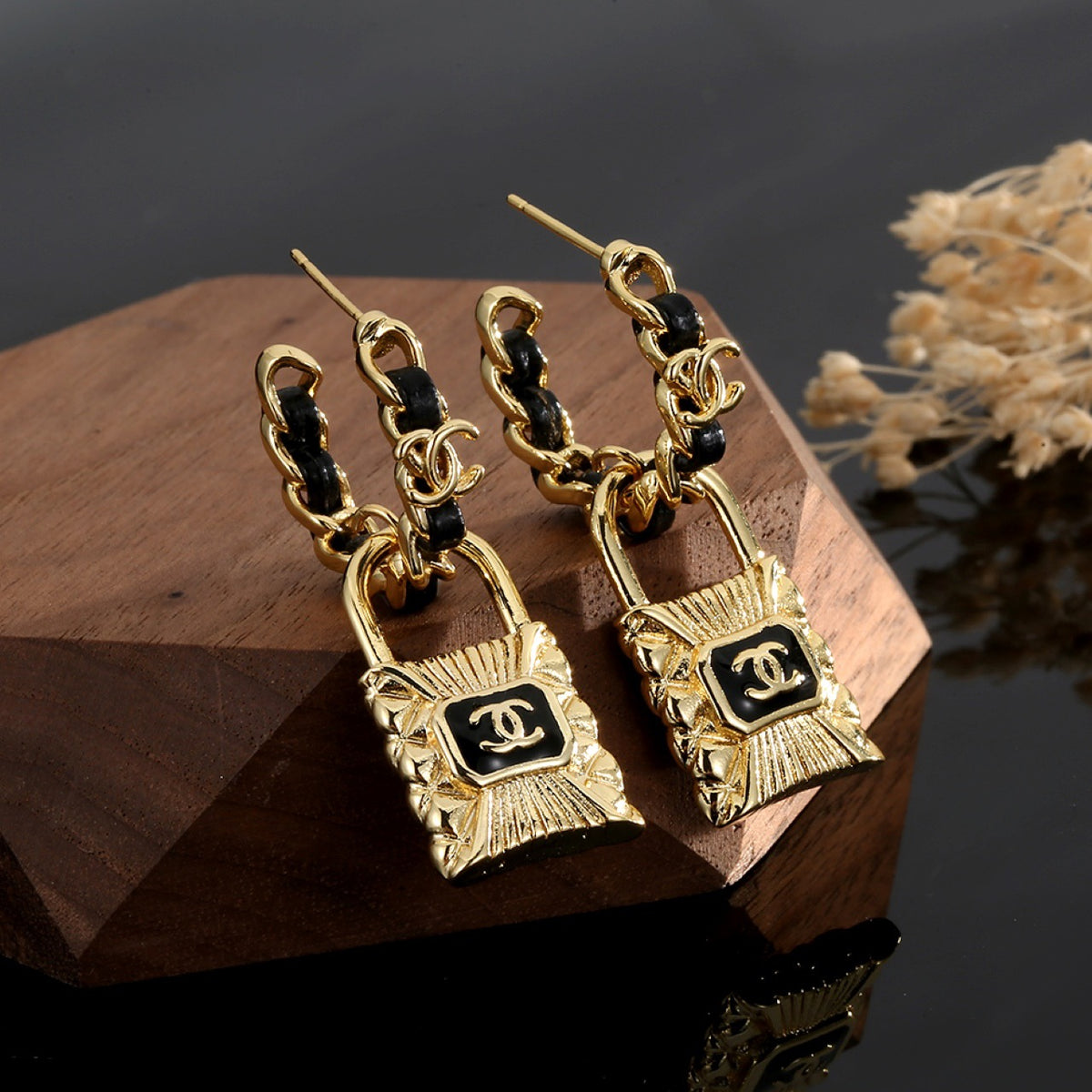 Double-C Emblem Stud Earrings in Gold-Tone – Design 050 close-up detail