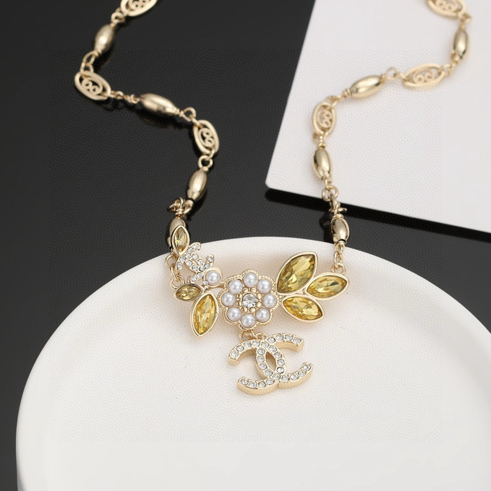 Camellia Pendant Necklace in Gold-Tone – Camellia Detail – Design 007 front product view