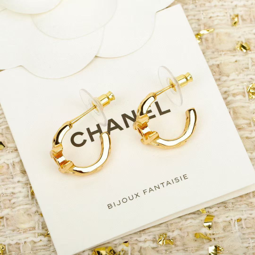 Double-C Emblem Stud Earrings in Gold-Tone – Design 044 close-up detail