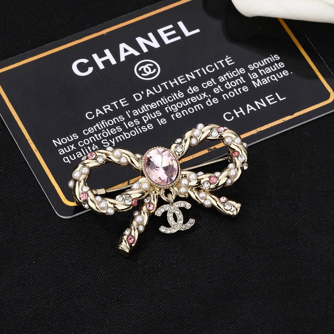 Double-C Emblem Brooch in Polished Metal-Tone – Pink Detail styled product view