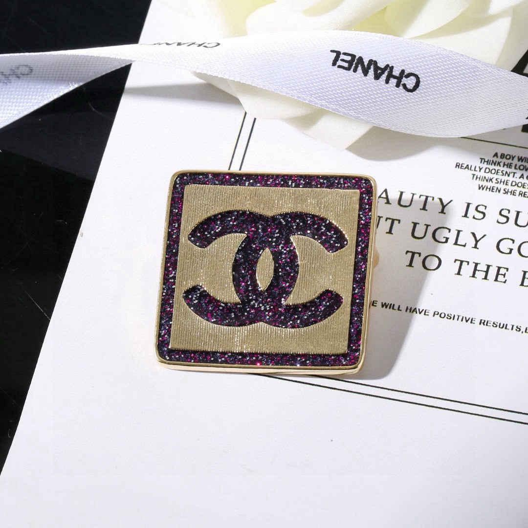 Signature Emblem Brooch in Polished Metal-Tone – Design 018 close-up detail