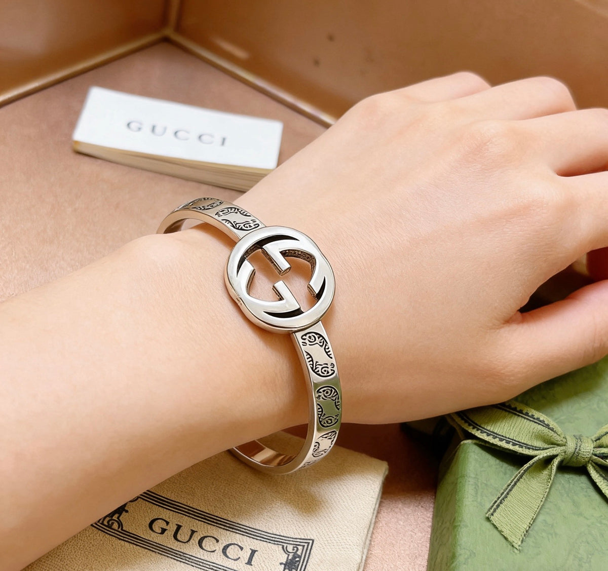 Double-G Emblem Bangle in Polished Metal-Tone – Design 008 styled product view