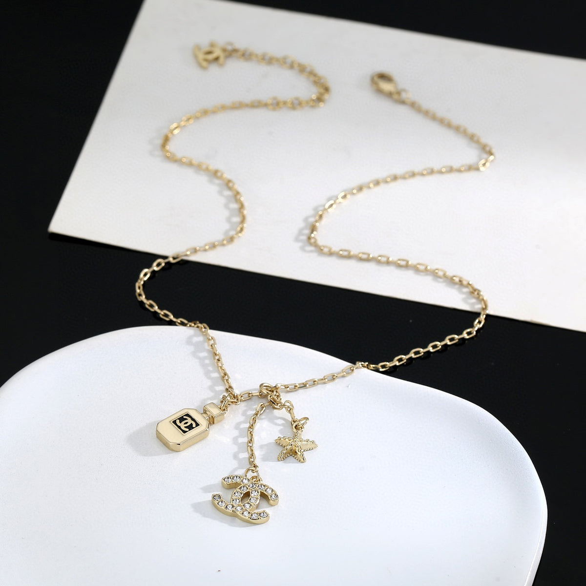 Double-C Emblem Pendant Necklace in Polished Metal-Tone – Design 009 main product view