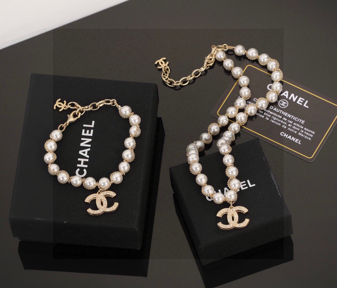 Double-C Emblem Bracelet in Polished Metal-Tone – Pearl Detail – Design 002 main product view