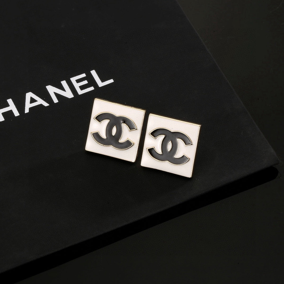 Double-C Emblem Stud Earrings in Gold-Tone – Design 006 close-up detail