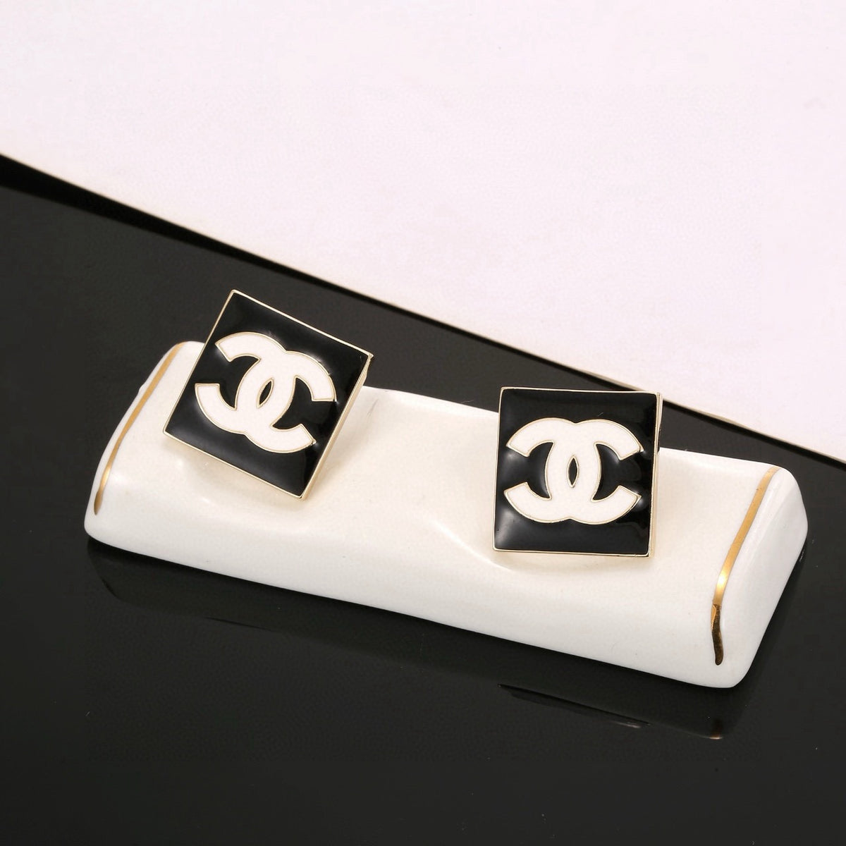 Double-C Emblem Stud Earrings in Gold-Tone – Design 006 detail view
