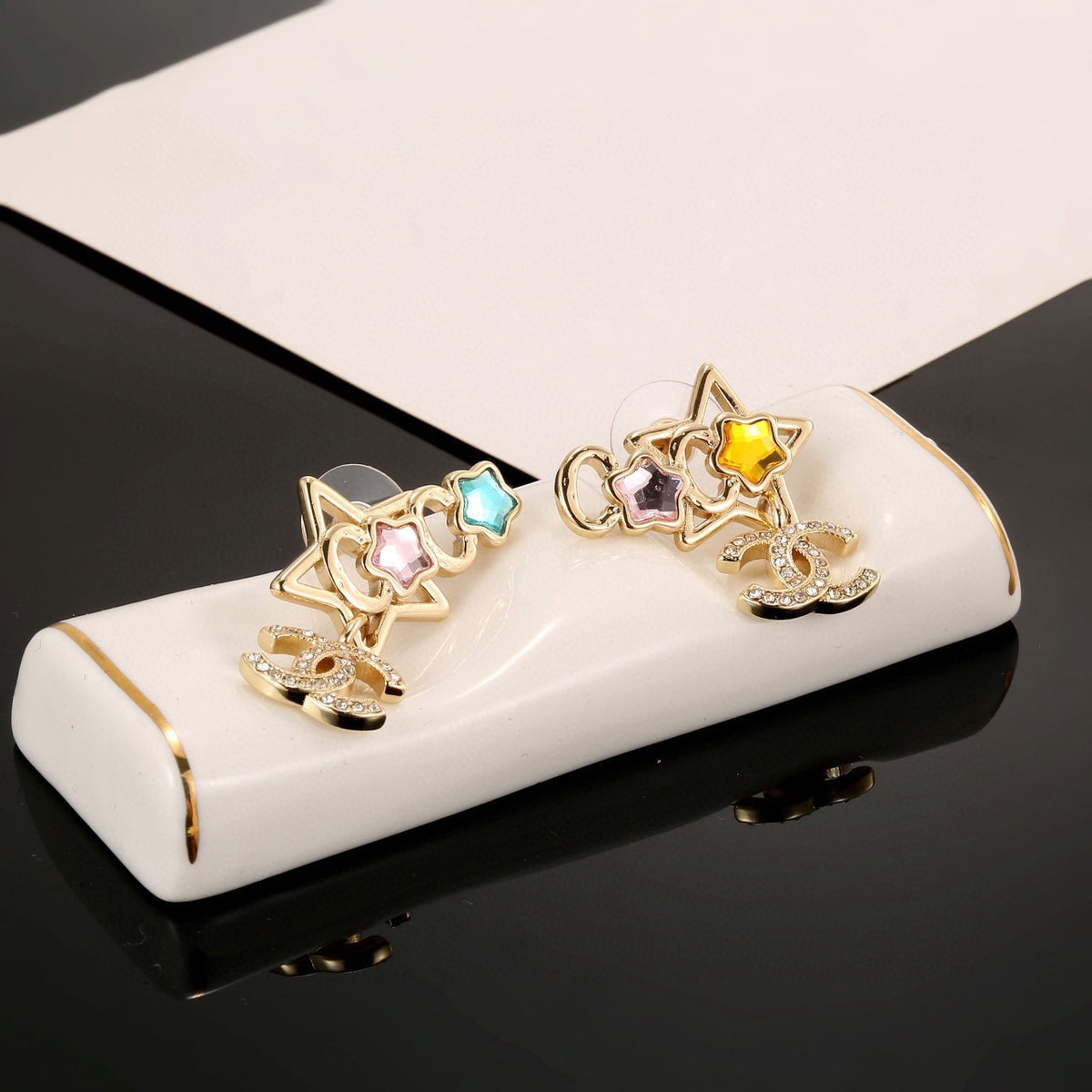 Double-C Emblem Stud Earrings in Gold-Tone – Star Detail side detail