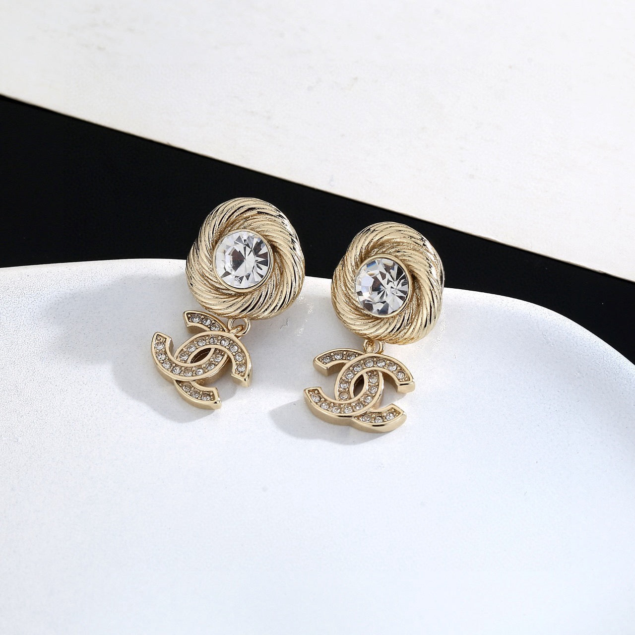 Double-C Emblem Stud Earrings in Gold-Tone – Design 001 close-up detail